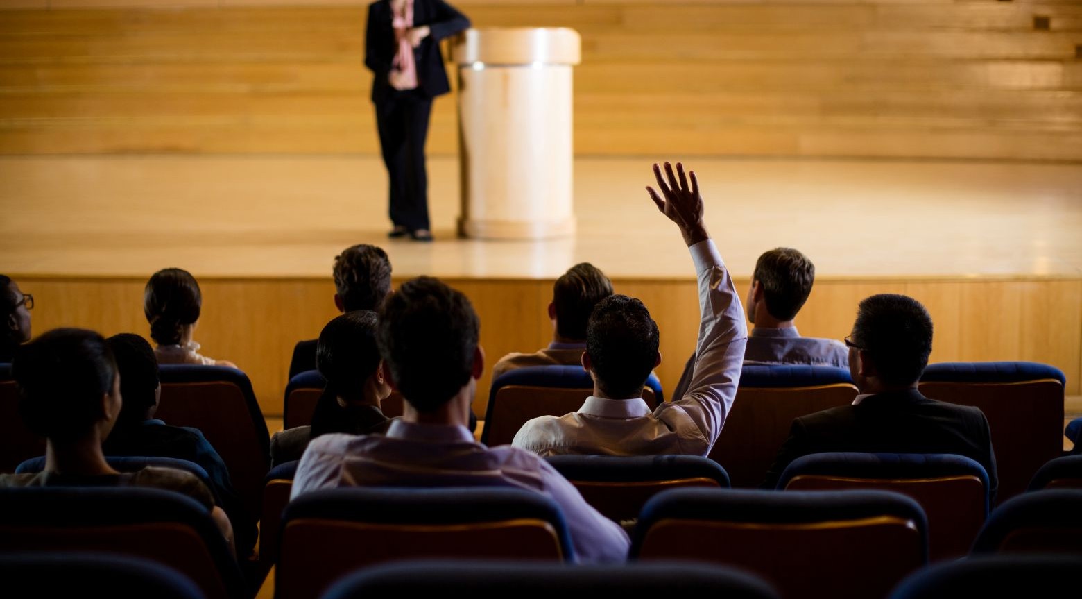 https://sunfixconsulting.com/wp-content/uploads/2025/08/female-business-executive-giving-speech.jpg
